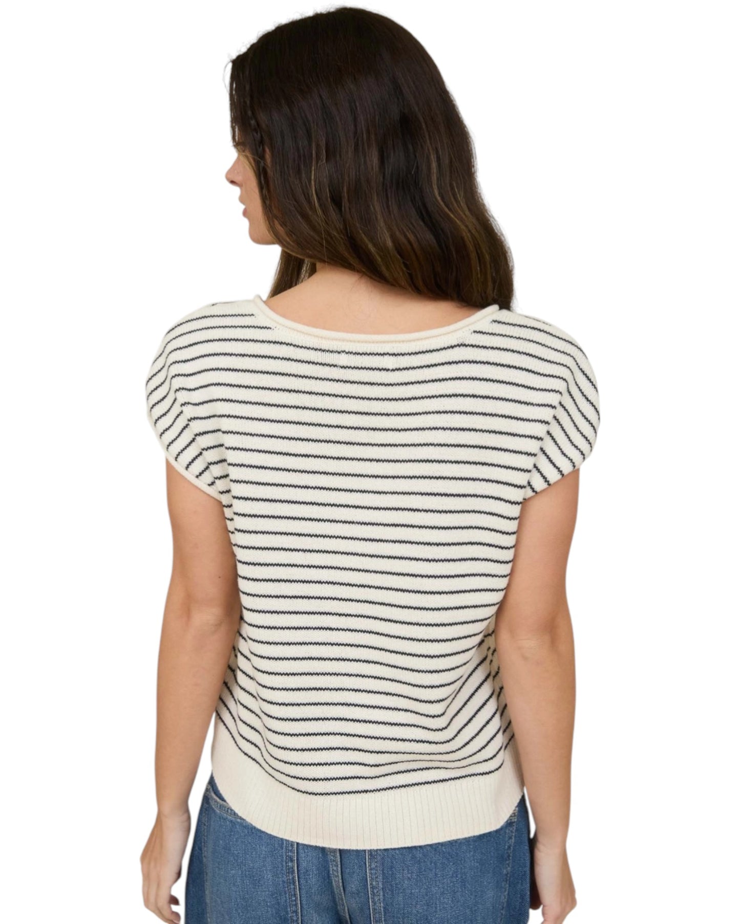 Woman wearing a Cream and Navy striped short sleeve button up cardigan.