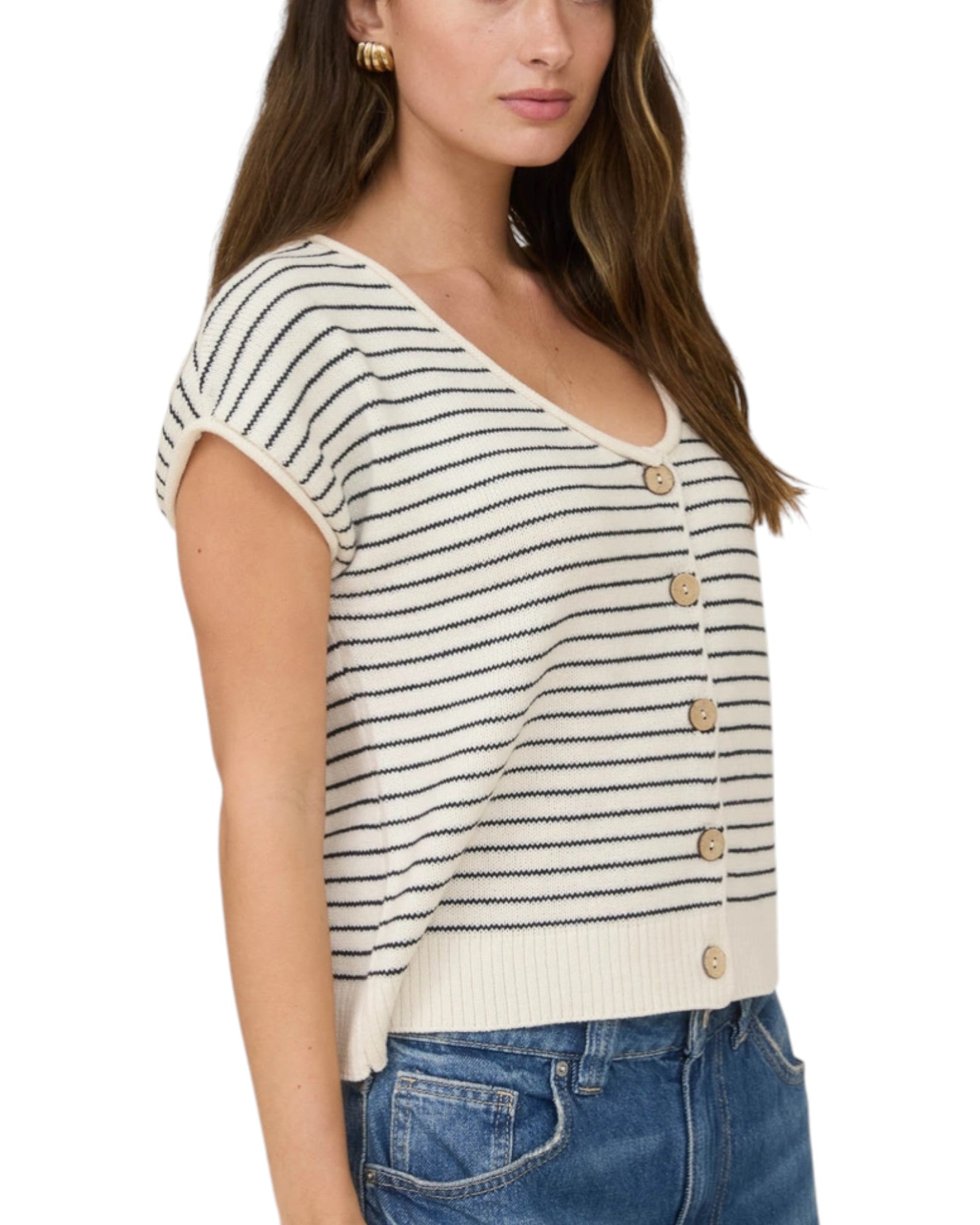 Woman wearing a Cream and Navy striped short sleeve button up cardigan.