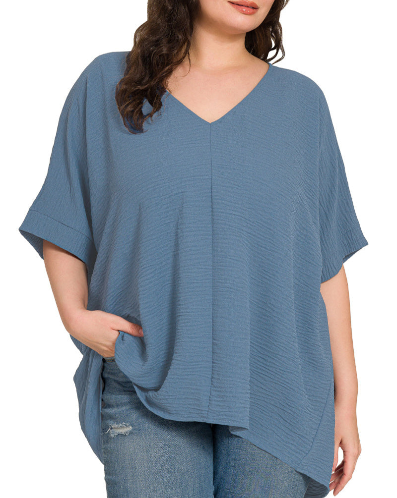 Dusty Blue lightweight woven short sleeve top in Curvy/Plus size.
