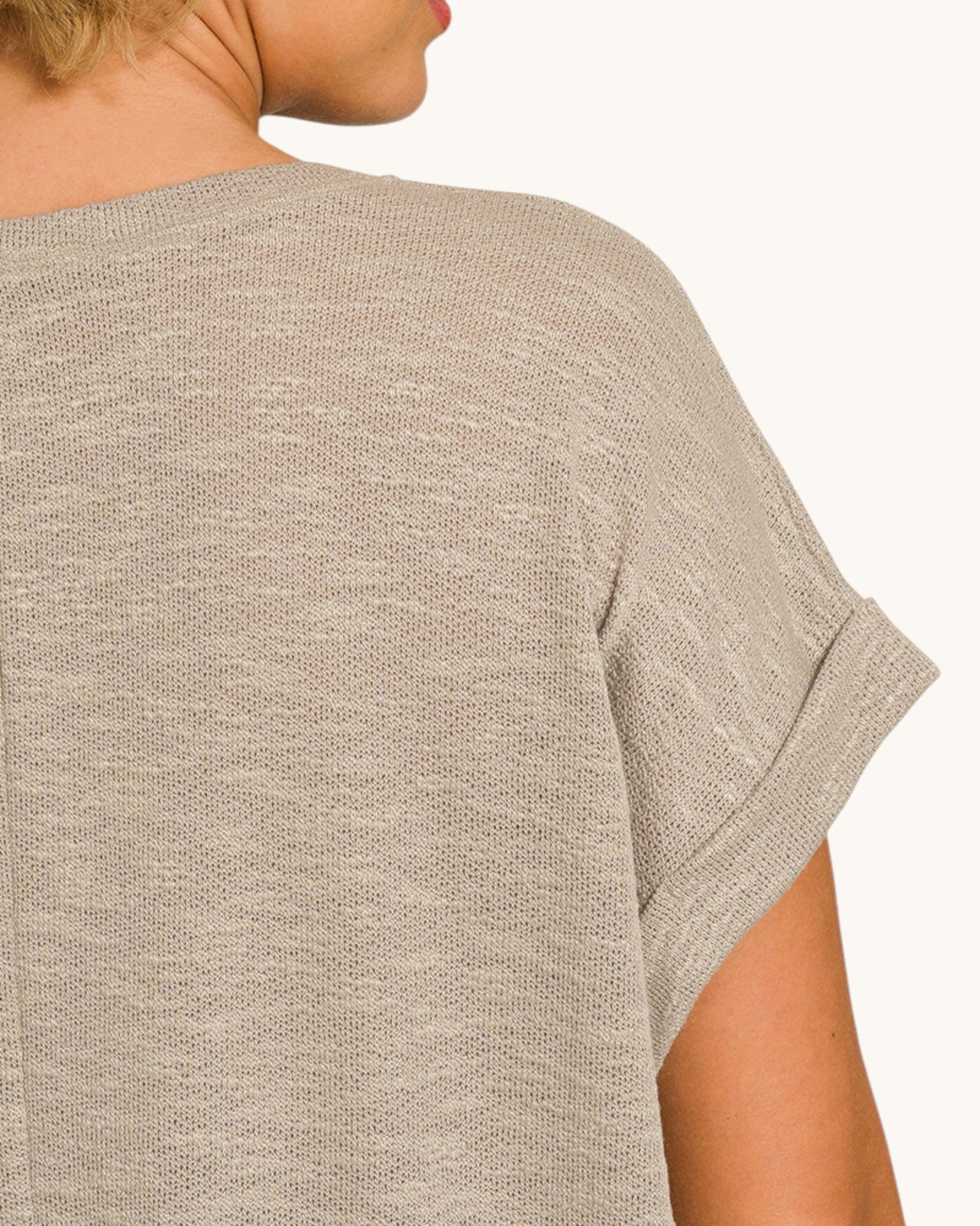 Close up of an Ash Mocha Slub Short Sleeve Tee on a light background. 