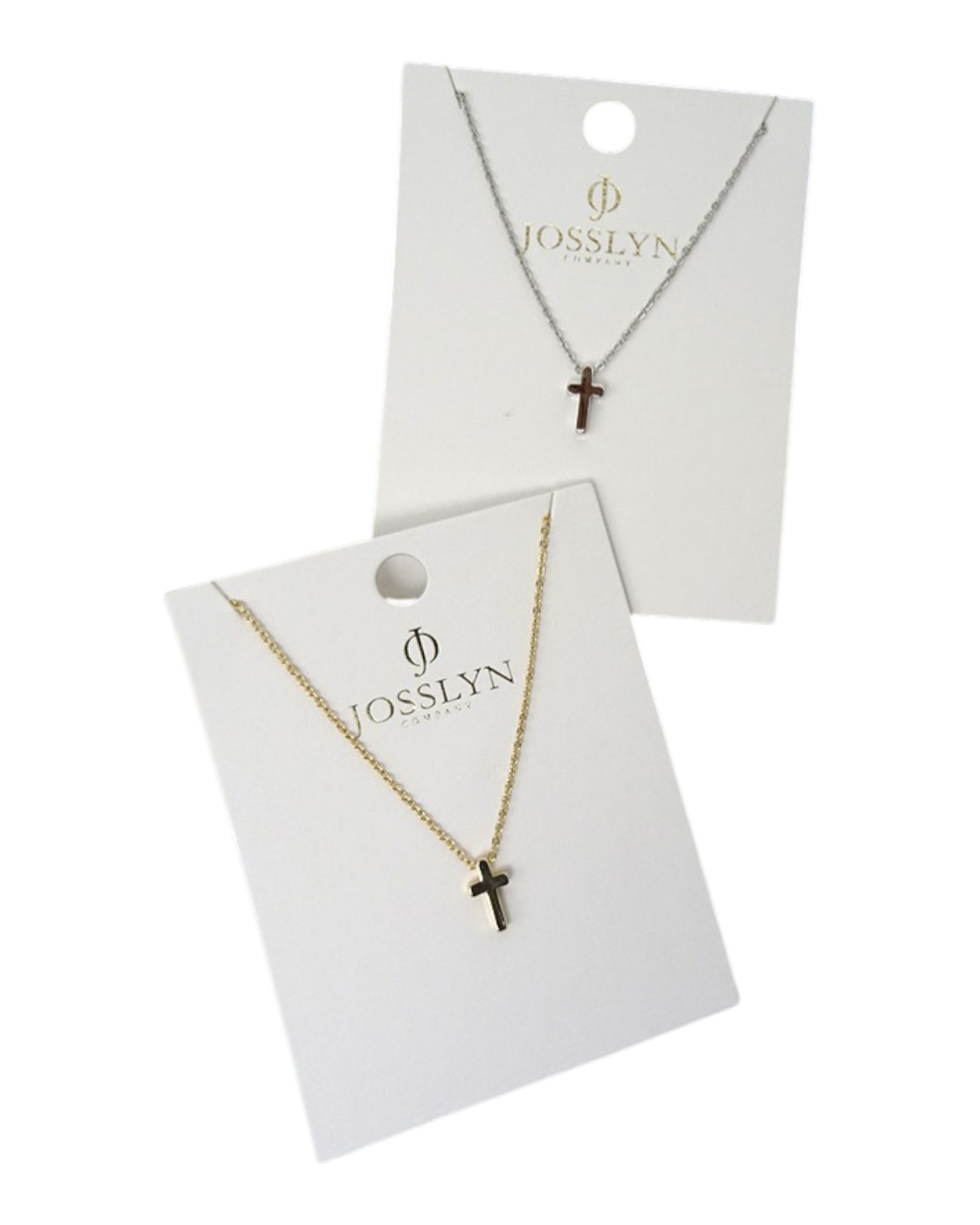 Two necklaces with cross pendants on Josslyn branded cards.