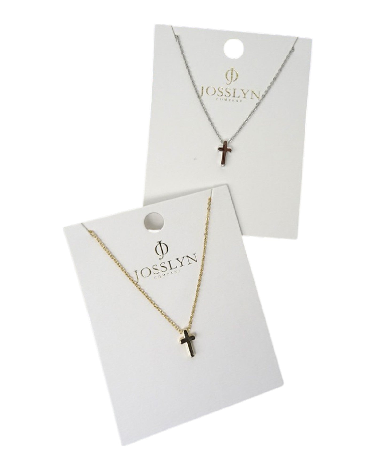 Two necklaces with cross pendants on Josslyn branded cards.