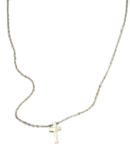 Silver necklace with a small cross pendant on a white background.