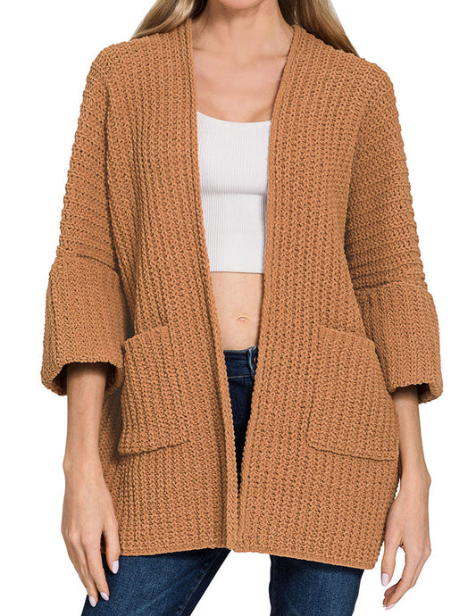 Woman wearing a Deep Camel Chunky Knit Boxy cardigan on a white background.