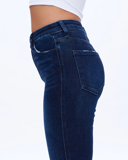 Slim and Straight Super Stretch Mid-Rise Jeans in Deep Sea Blue