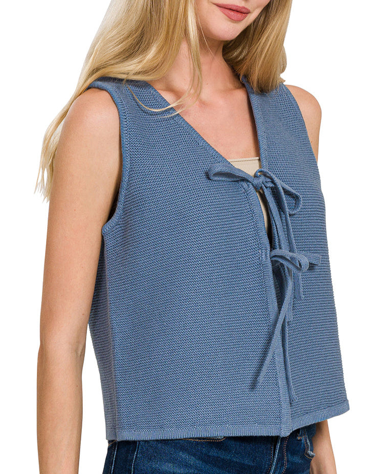 Dusty Blue 100% Cotton sleeveless sweater vest with two ties in front and semi-cropped cut.
