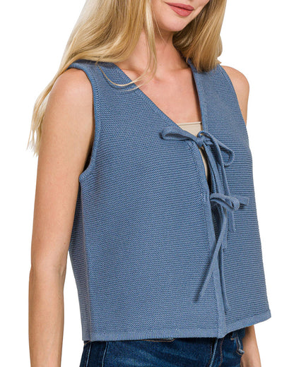 Dusty Blue 100% Cotton sleeveless sweater vest with two ties in front and semi-cropped cut.