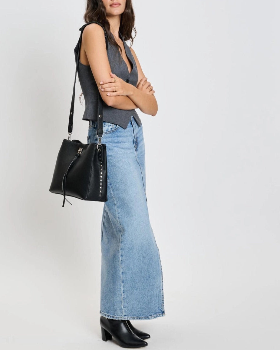 Eliza tassel vegan leather crossbody handbag with studs and turn lock in Almond or Black.