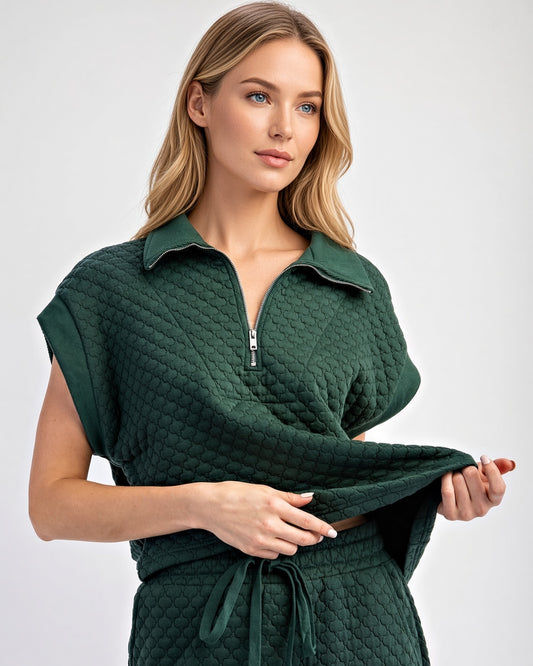 Front view of Forest textured short sleeve pullover with collared half-zip neckline and relaxed fit.