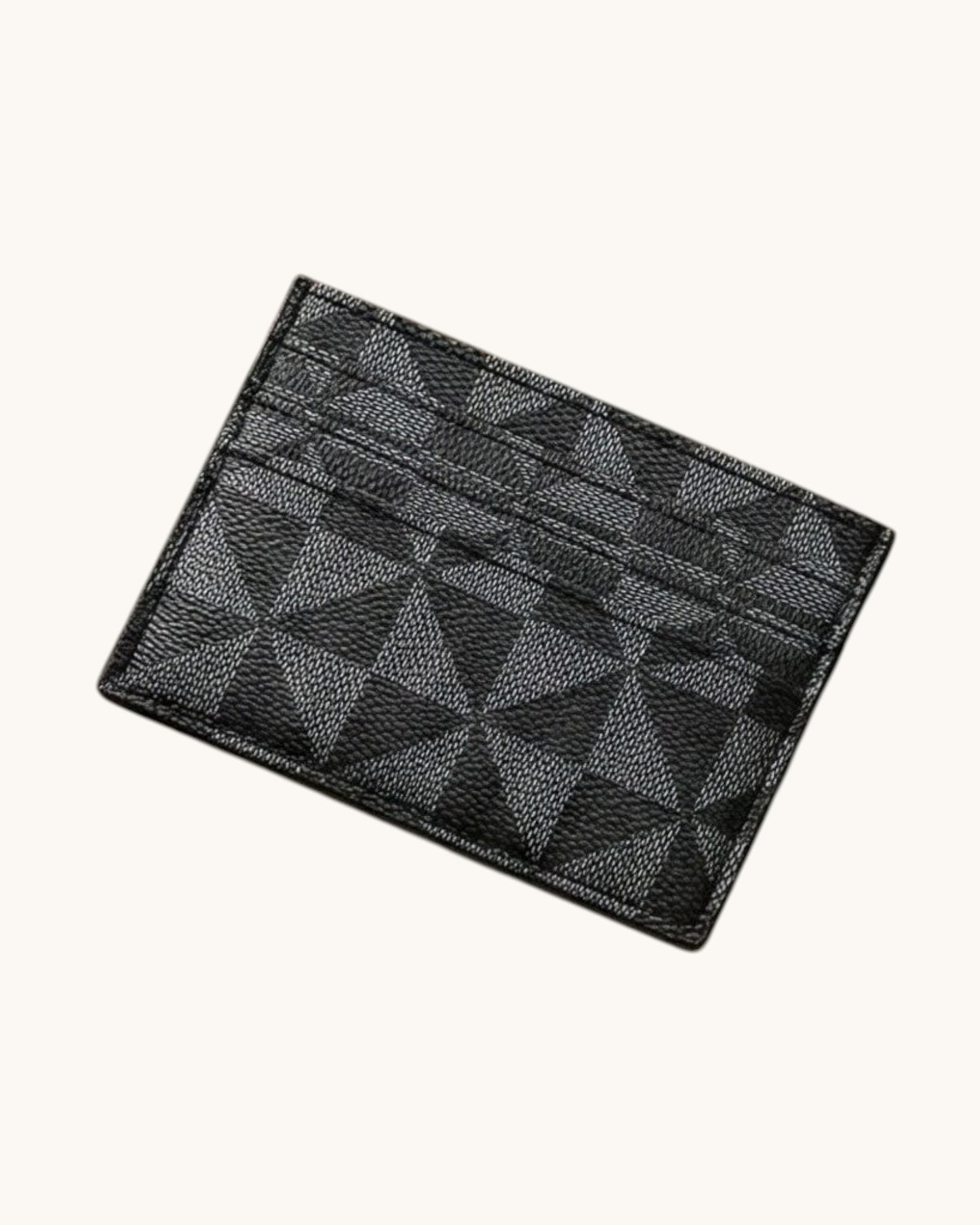 Black textured cardholder on a white background.