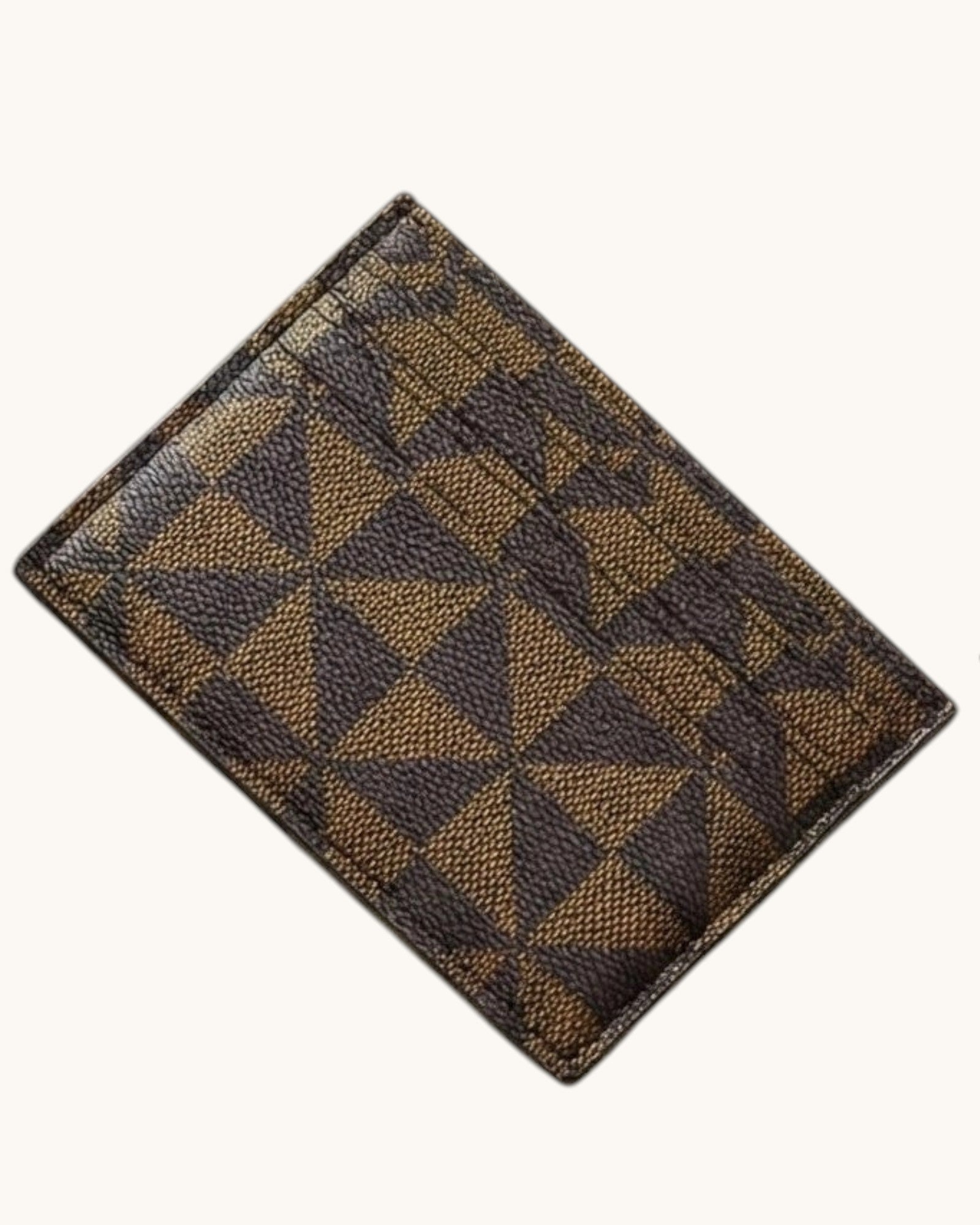Brown checkered wallet on a white background