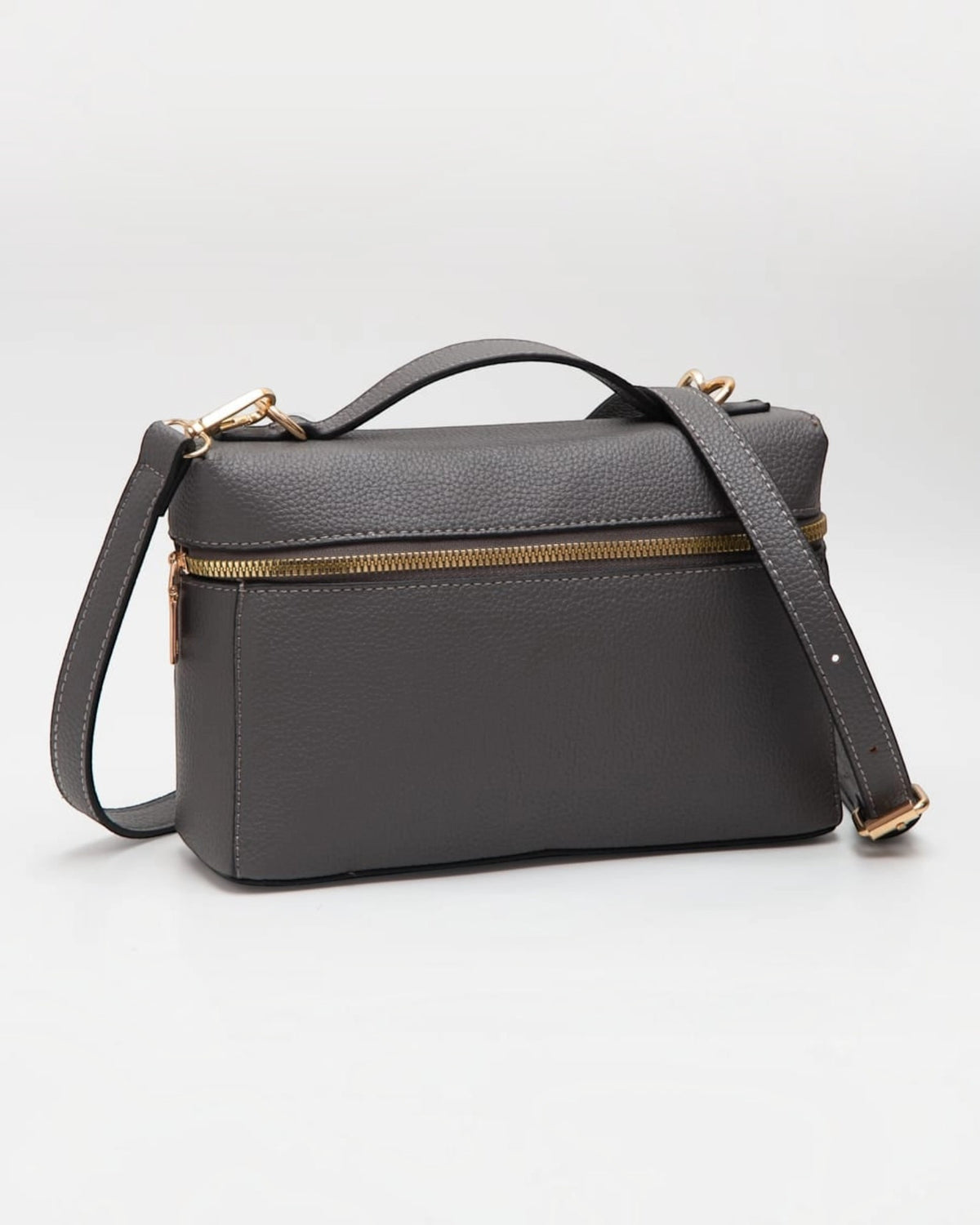 Gray Top Handle Crossbody Pebbled Faux Leather Handbag with adjustable and removable shoulder strap and gold hardware. 