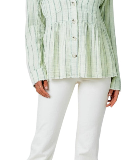 Green striped peplum jacket with white pants on a white background.