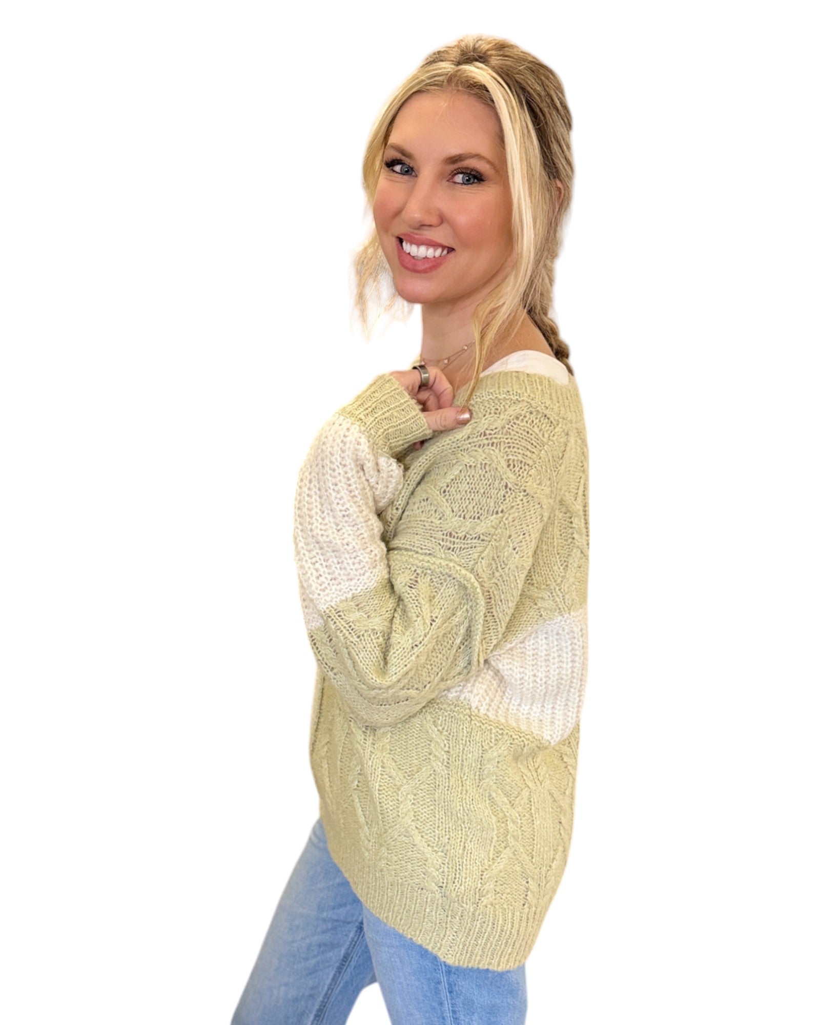 Super Soft Light Sage and Cream Color Block Sweater with a V-neckline, long sleeves, and a relaxed fit in soft knit fabric, perfect for layering or standalone wear.