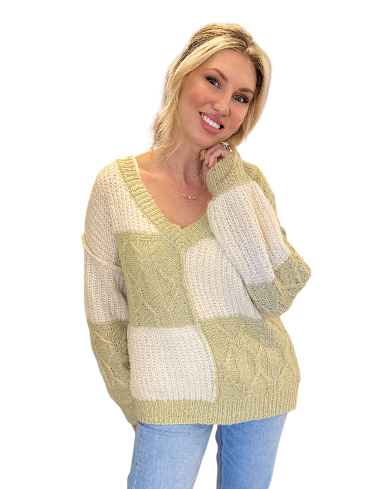 Super Soft Light Sage and Cream Color Block Sweater with a V-neckline, long sleeves, and a relaxed fit in soft knit fabric, perfect for layering or standalone wear.