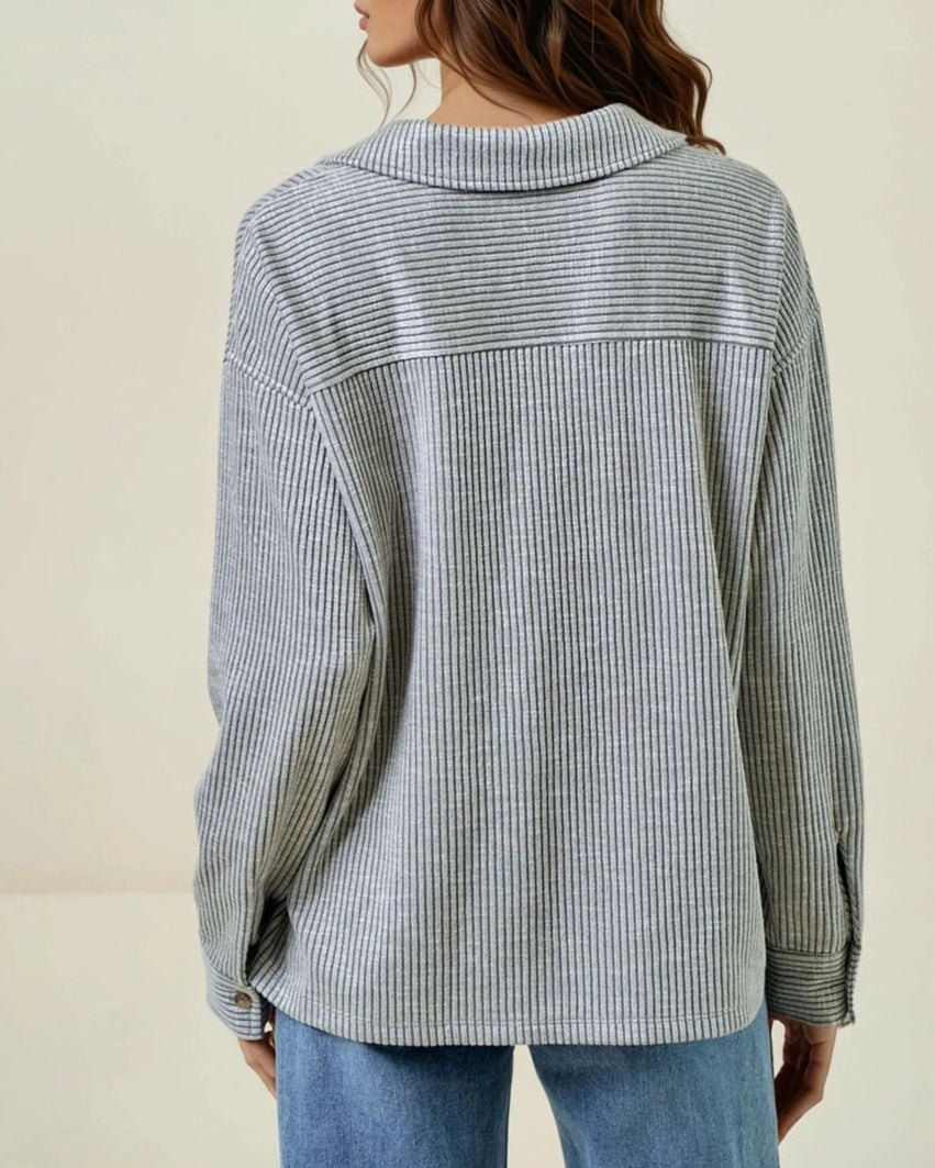 Grey two tone ribbed pullover with collar and rounded pockets. 