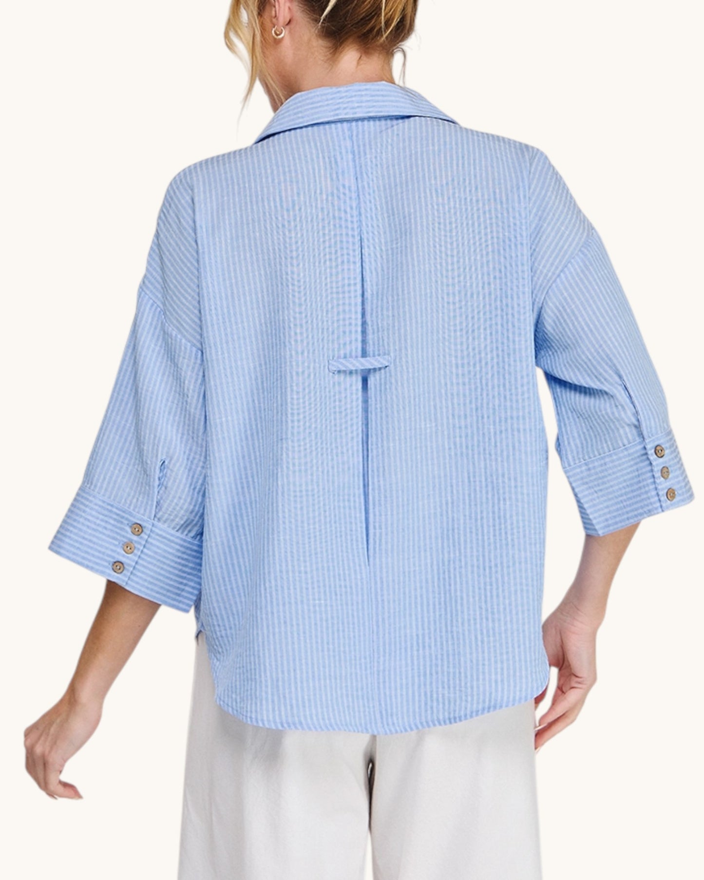 Back view of the Hampton Breeze Woven Button Up Shirt with a classic collar and 3/4 length sleeves. 
