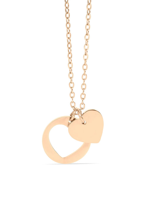 Gold heart cutout necklace on a white background.