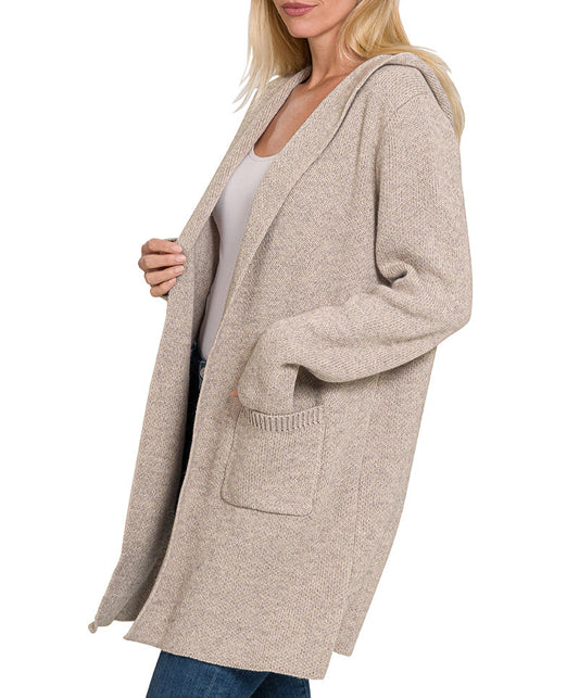 Woman wearing a Heather Mocha hooded open front cardigan with front pockets and mid-thigh length.