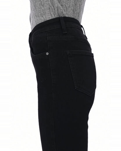 Close up  of the waist and thigh area of the the high rise black flare jeans.