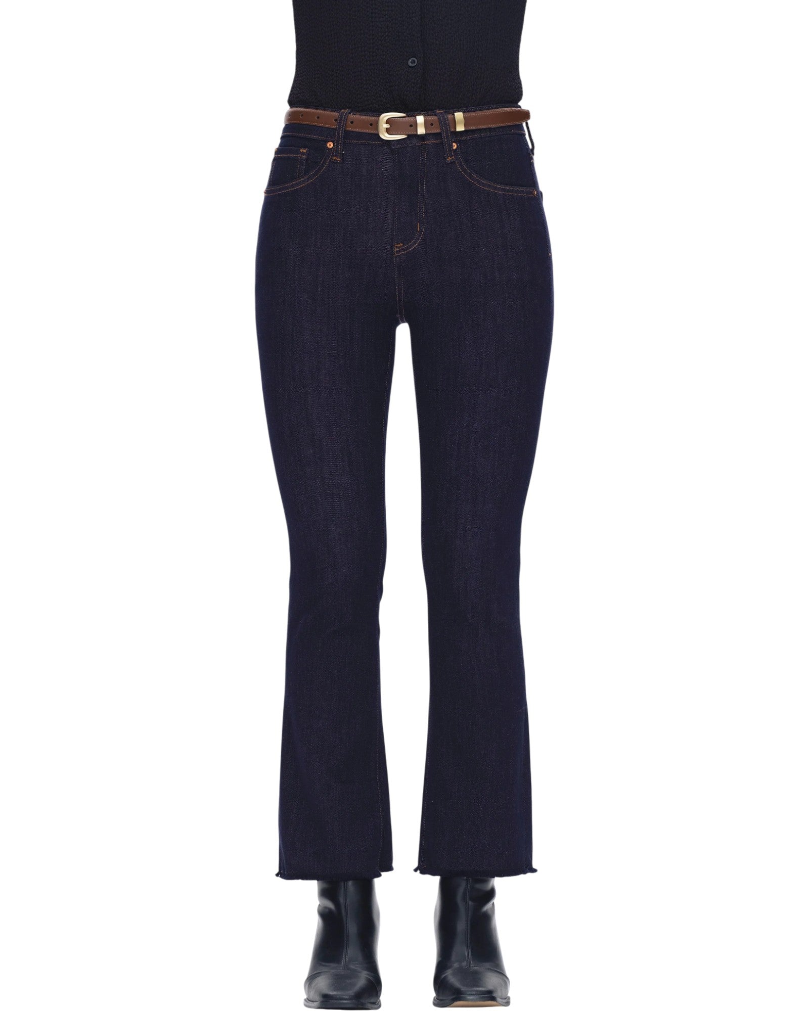 Dark blue jeans with a brown belt on a white background