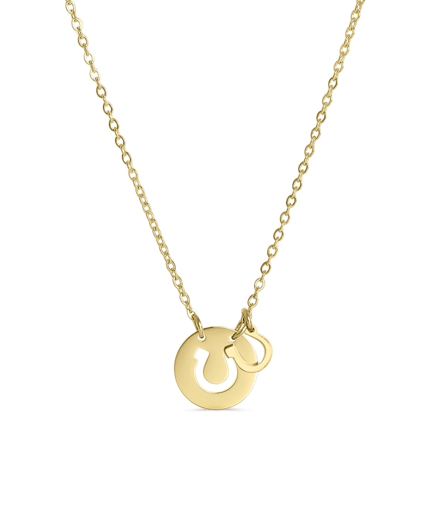 Gold necklace with a horseshoe pendant on a white background.