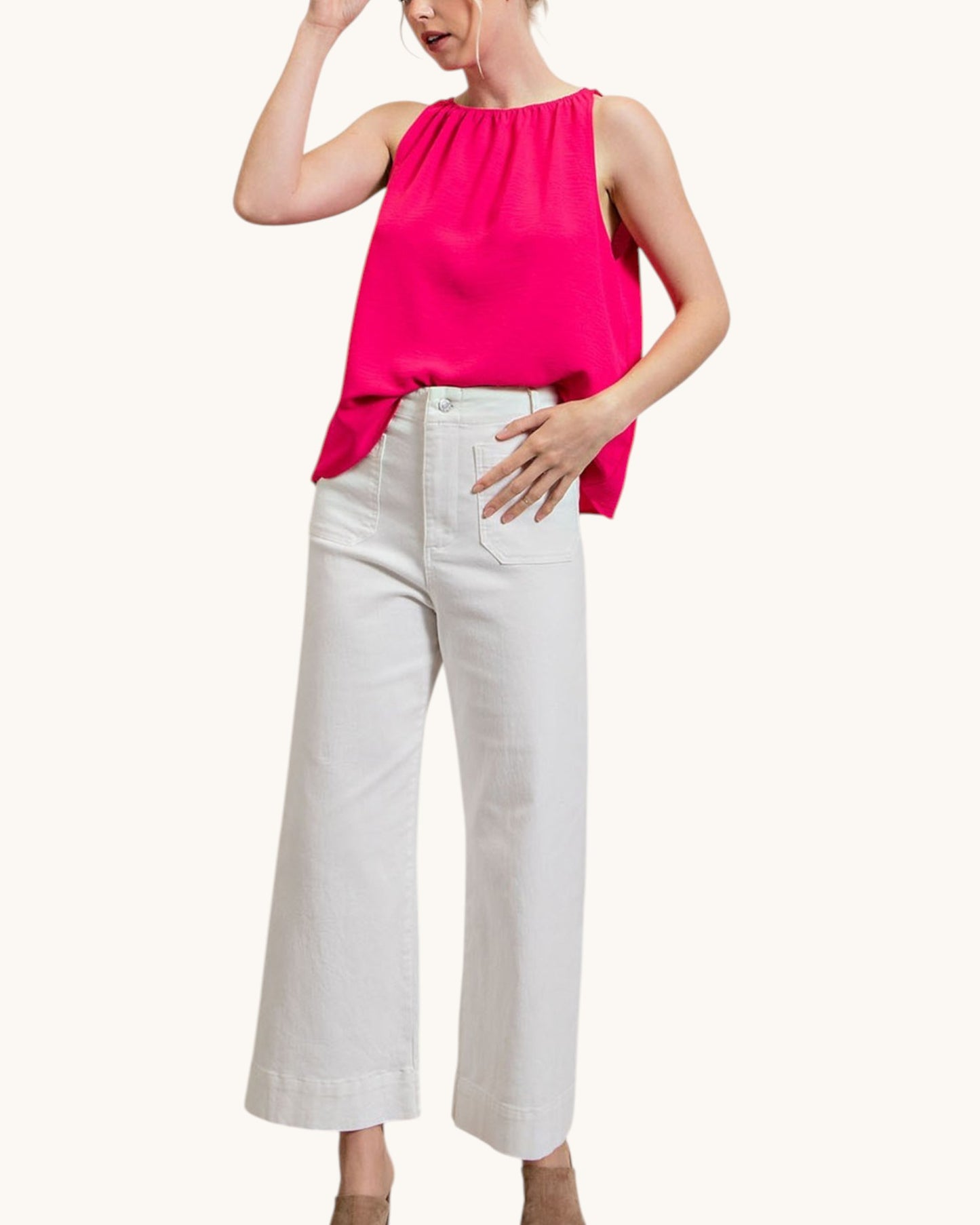 Pink Rush Ruched Sleeveless Top with white pants.
