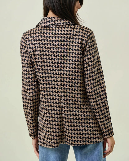 Woman wearing a Houndstooth Shawl Blazer Black and Mocha with open front and modern collar.
