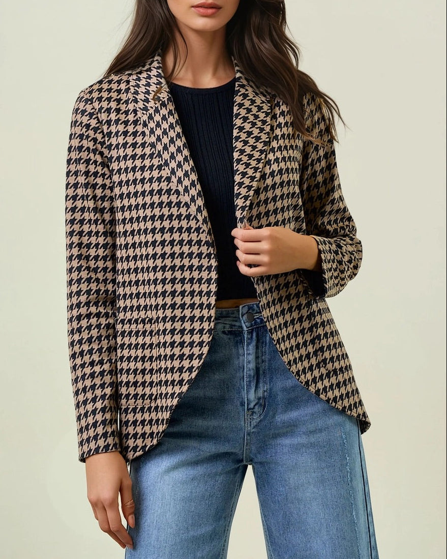 Woman wearing a Houndstooth Shawl Blazer Black and Mocha with open front and modern collar.