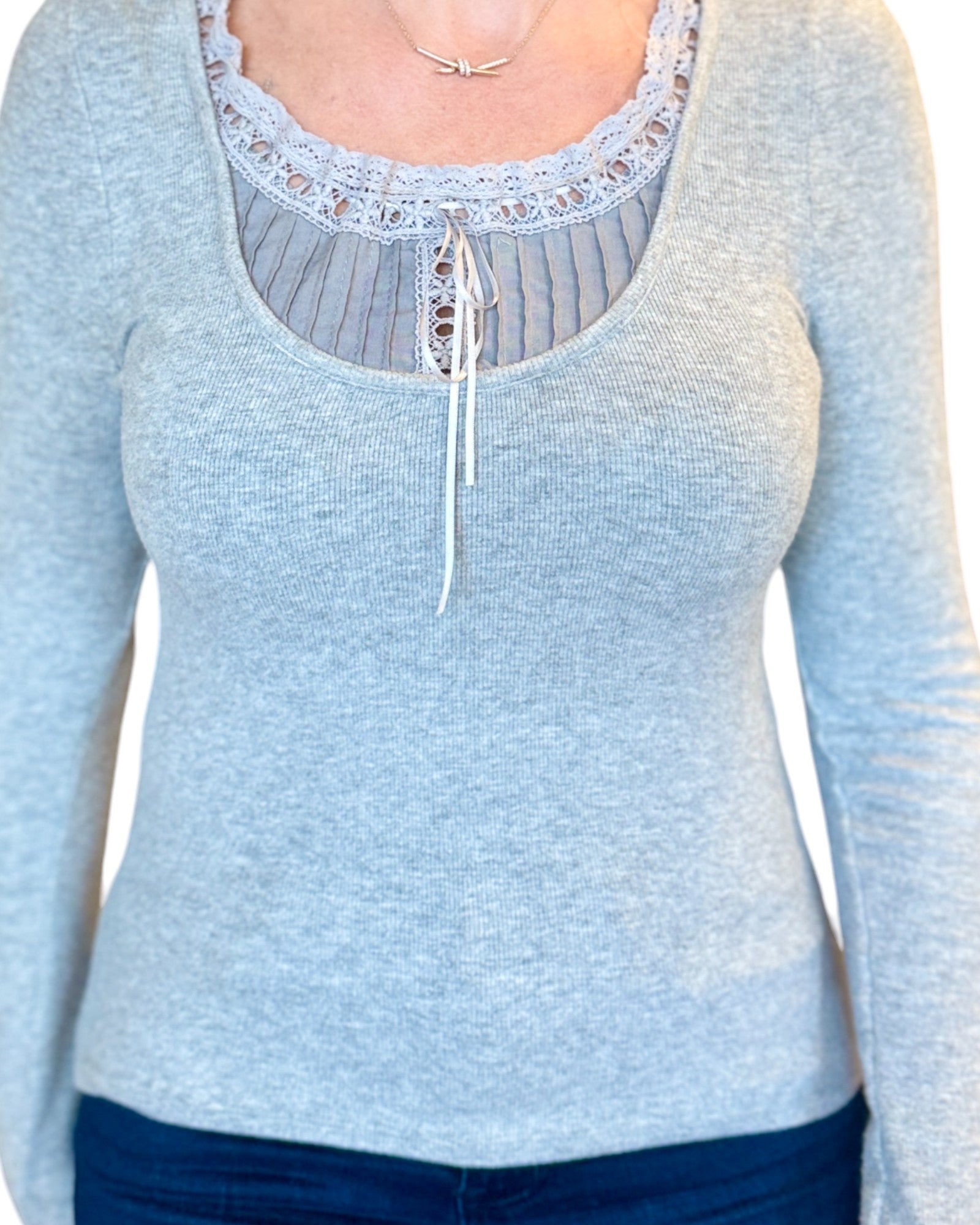 Grey soft ribbed long sleeve top with lace tie accent.