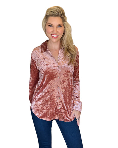 Woman wearing a Winter Rose Button-Down Velvet Shirt with a flattering, relaxed fit and button-front detail, perfect for holiday gatherings or a chic night out.