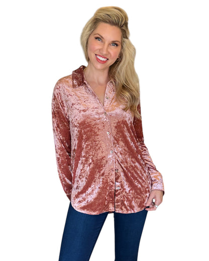 A Winter Rose Button-Down Velvet Shirt with a flattering, relaxed fit and button-front detail, perfect for holiday gatherings or a chic night out.