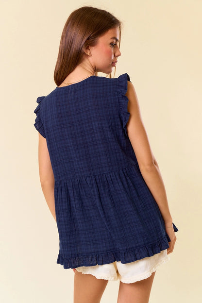 Navy gingham sleeveless tank top with ruffle trim and babydoll silhouette.