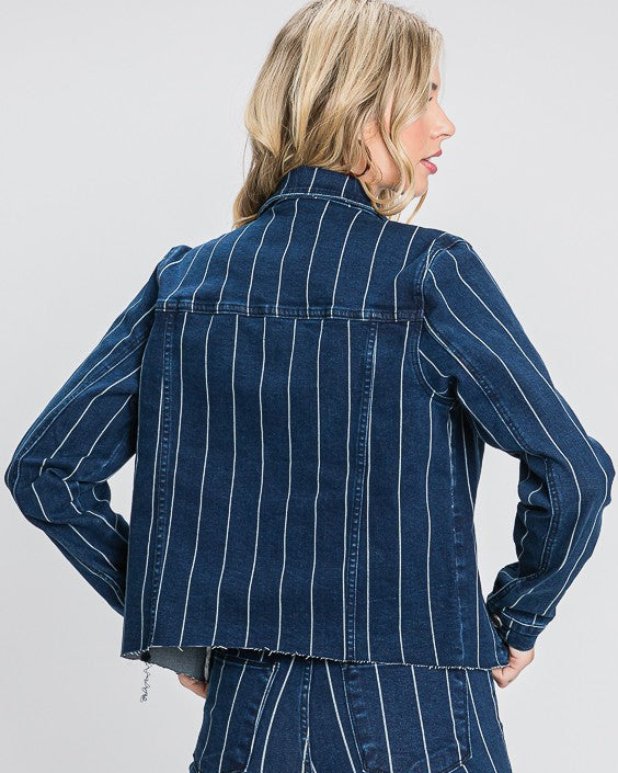 Dark blue cropped denim jacket with white pinstripes, raw edges, and button front detailing.
