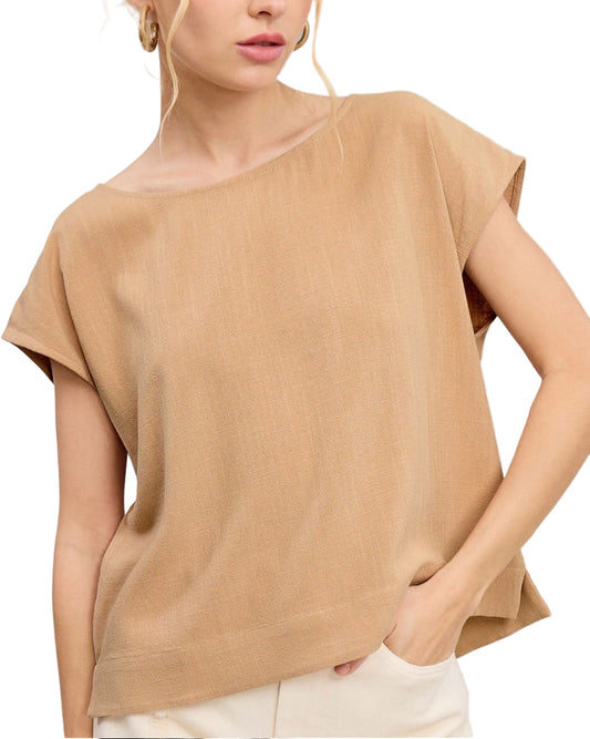 Woman wearing a Khaki linen-blend cap sleeve top with round neckline and side slits.