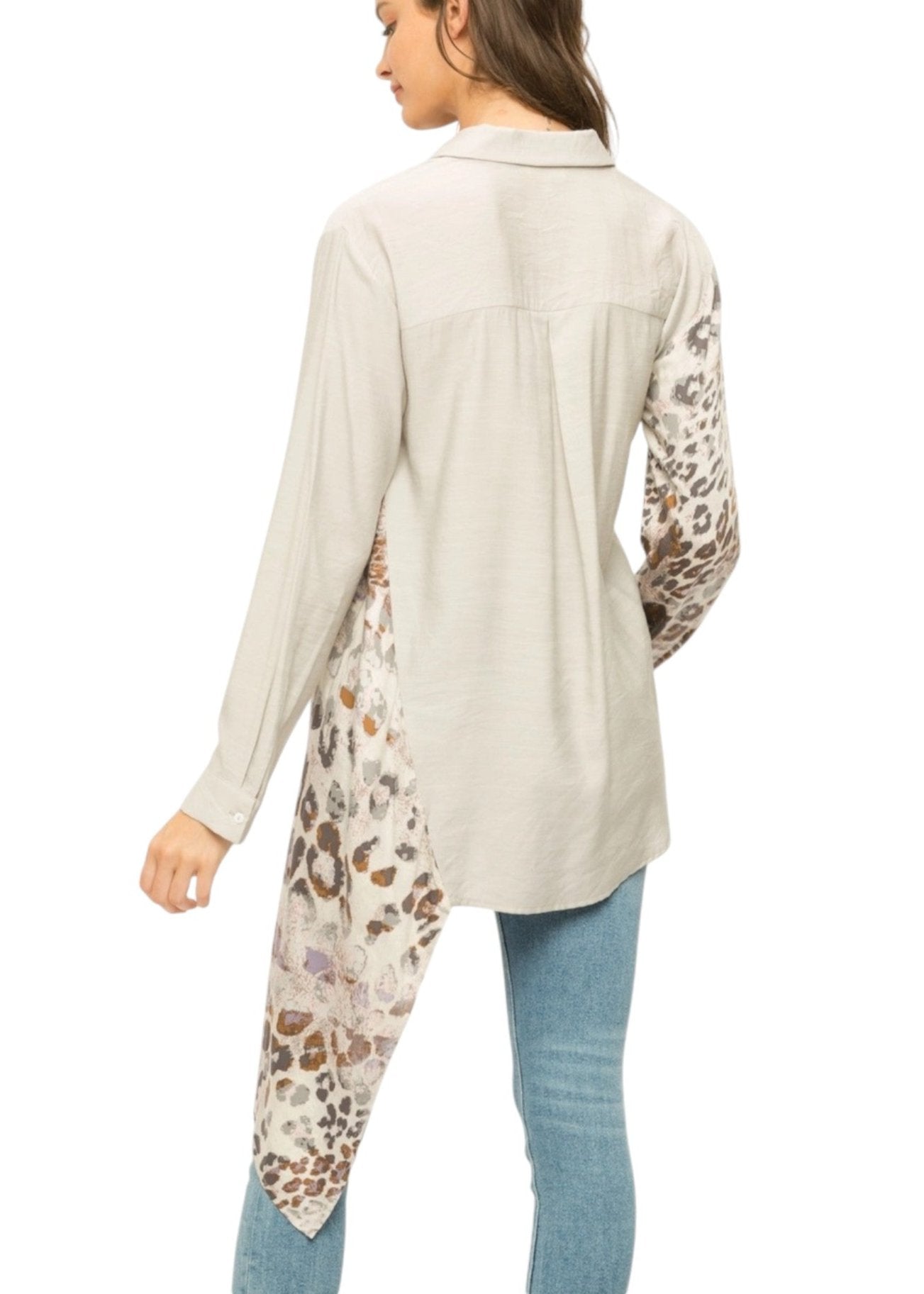 Leopard Luxe High-Low Button-Up Top with scarf-style leopard print inset, long sleeves, and asymmetrical hem in neutral tones.