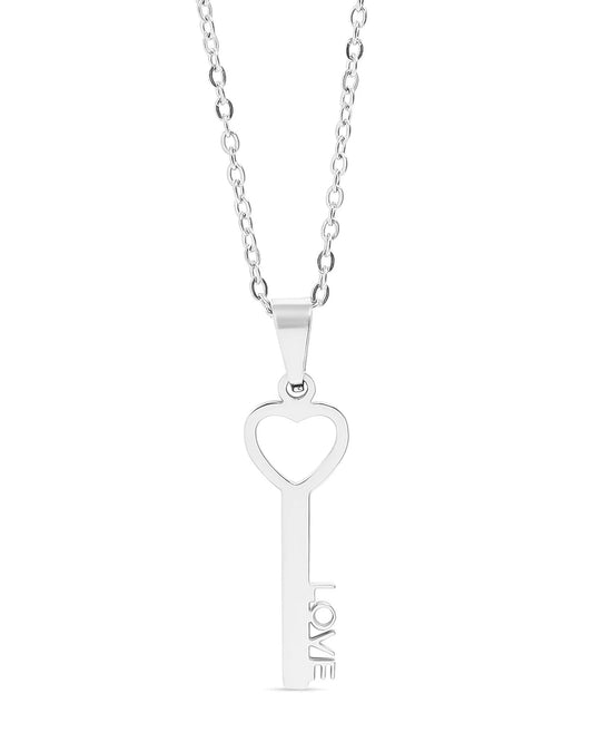 Silver key-shaped pendant with a heart cutout on a white background.