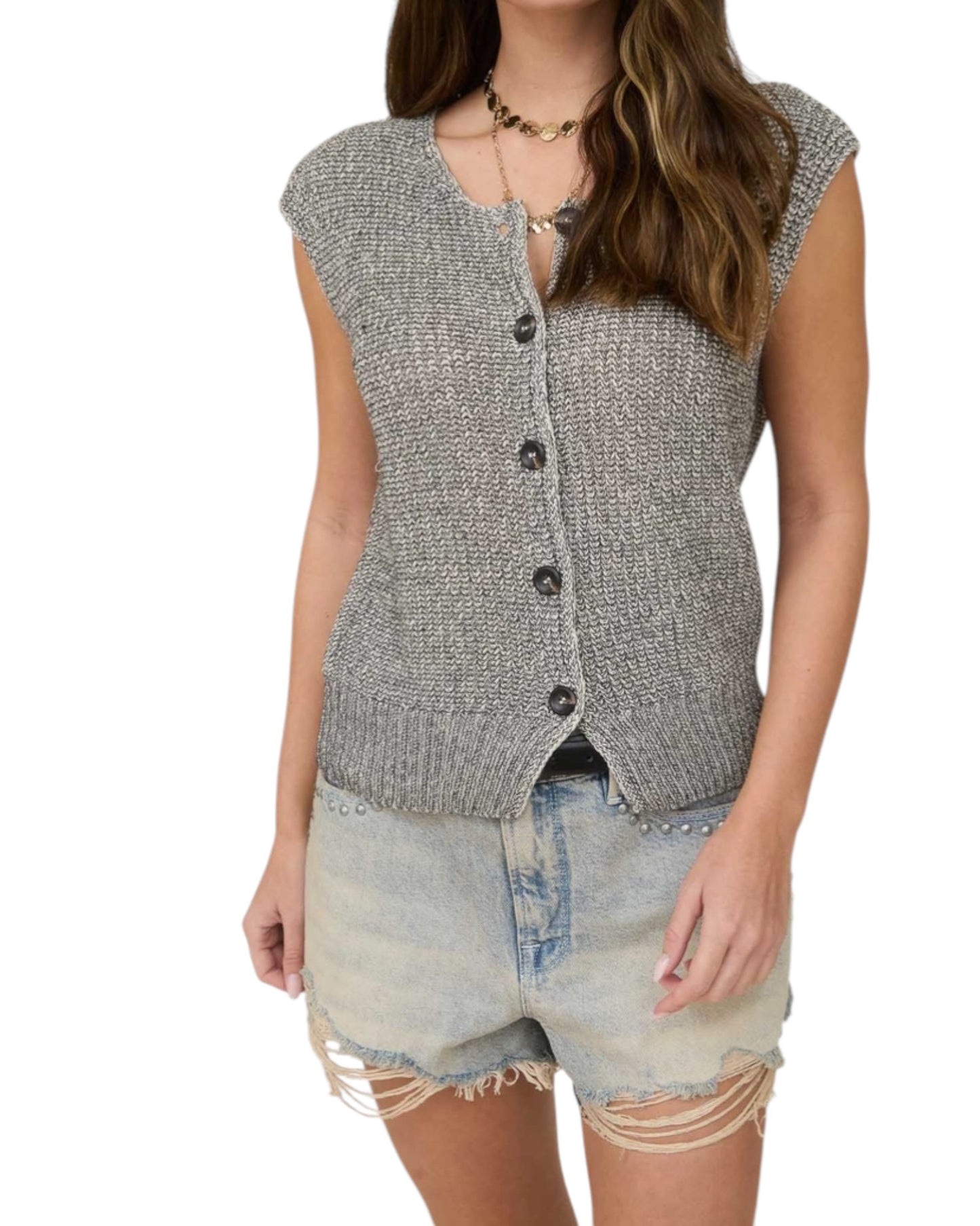 Woman wearing a gray sleeveless button-up vest and denim shorts on a white background.
