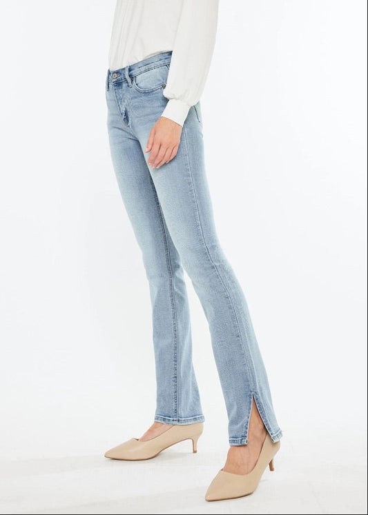 Kan Can Mid-Rise Split Hem Medium Wash Bootcut Jeans with flattering fit and side slit hem.
