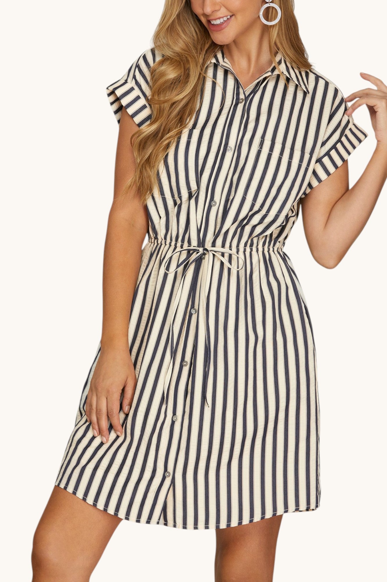 Woman wearing The Parker Navy Stripe Dress.
