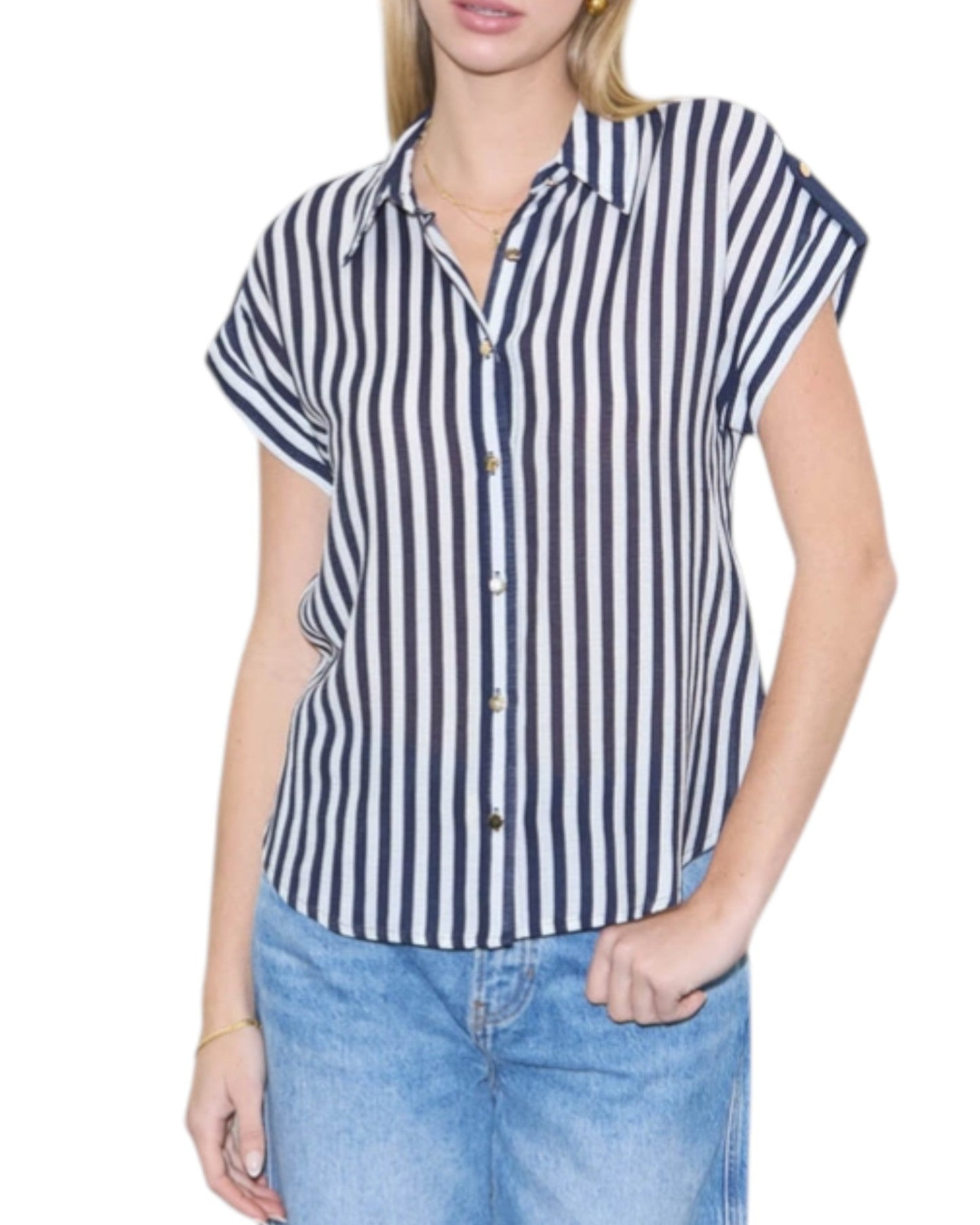 Woman wearing a navy and white striped shirt with short sleeves on a white background.
