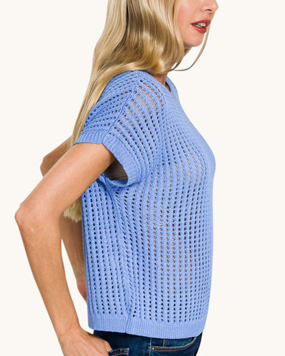 Open knit crochet short sleeve top in cornflower blue (side profile).