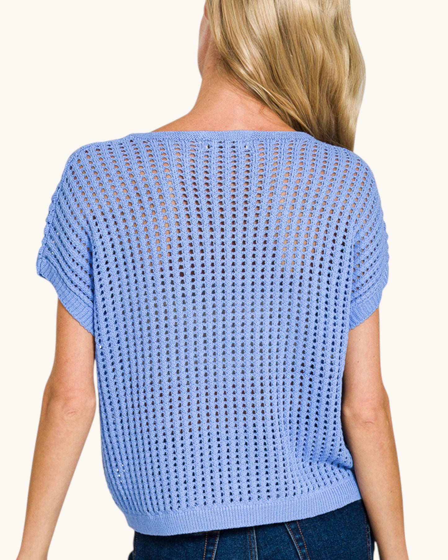 Open knit crochet short sleeve top in cornflower blue (back view).