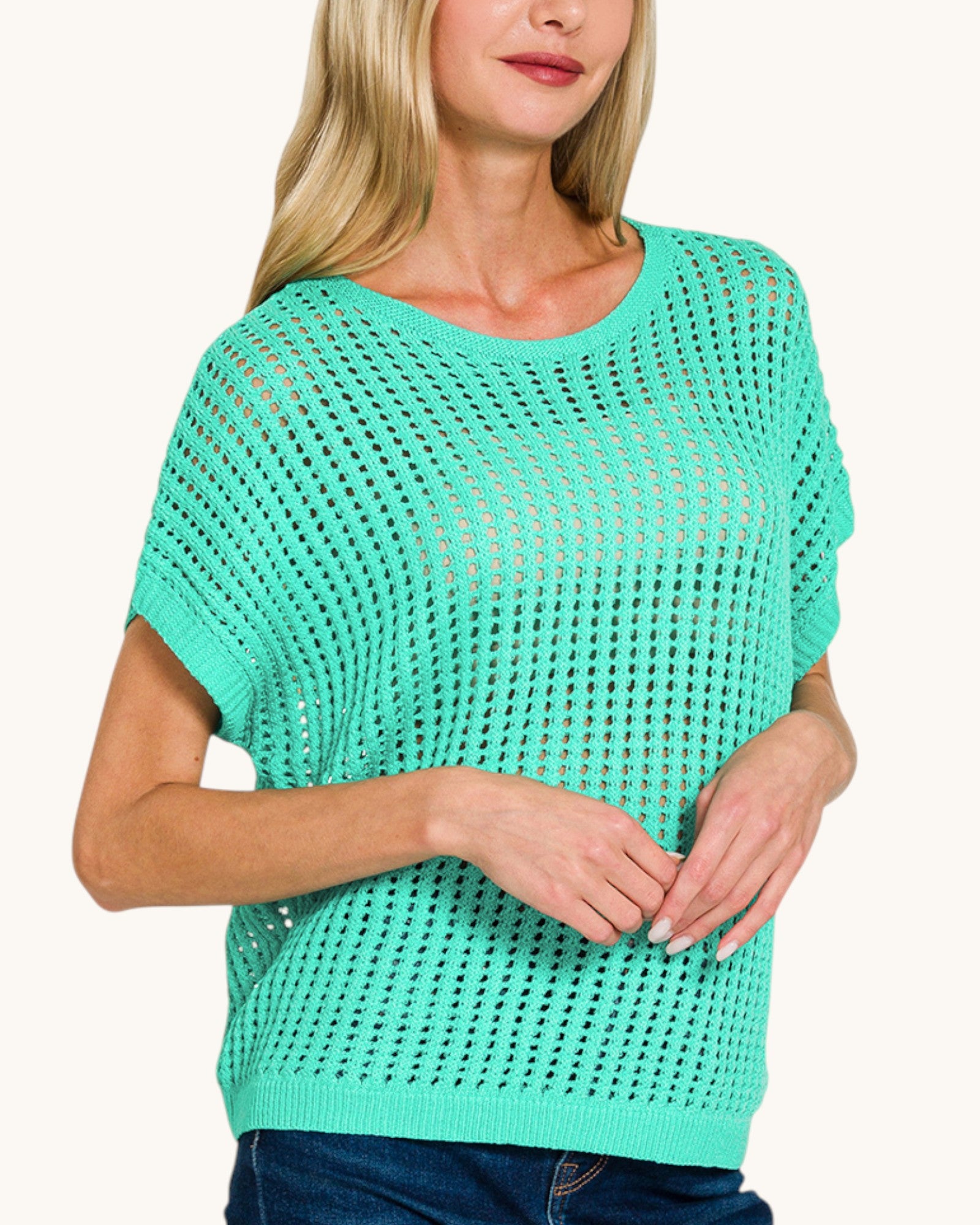 Woman wearing the Mint to Be open knit crochet short sleeve top. 