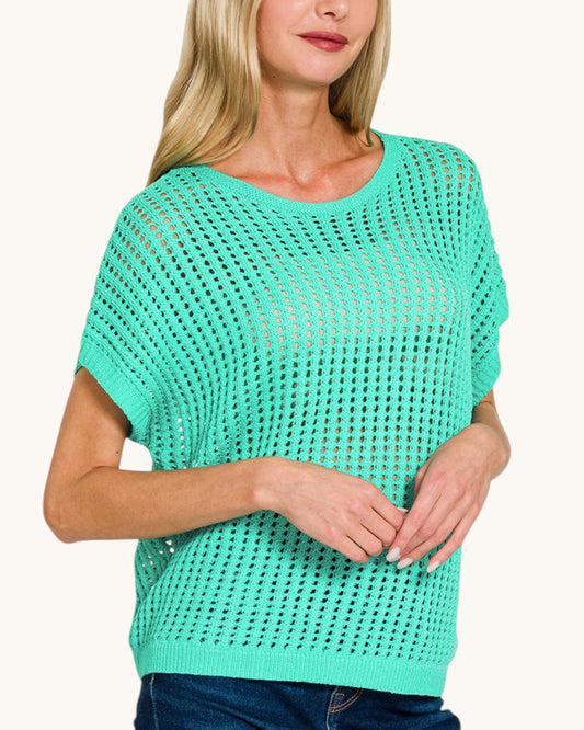 Woman wearing the Mint to Be open knit crochet short sleeve top. 