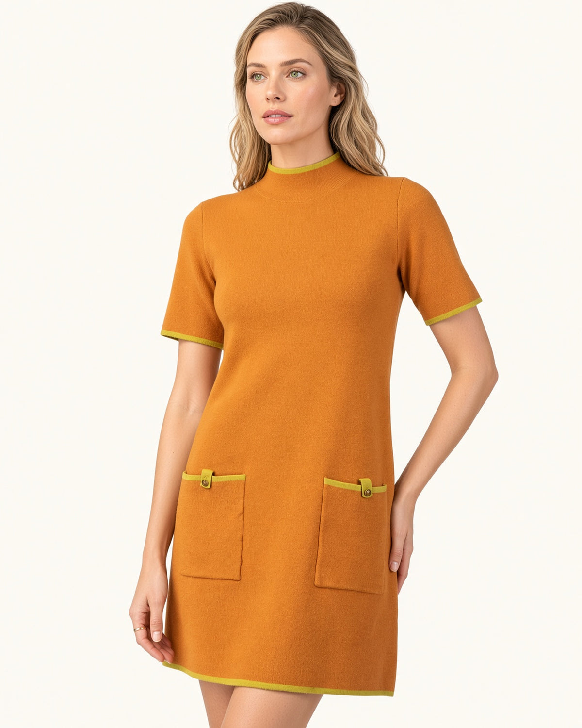 Ginger sweater dress with lime contrast trim, short sleeves, patch pockets, and button details.