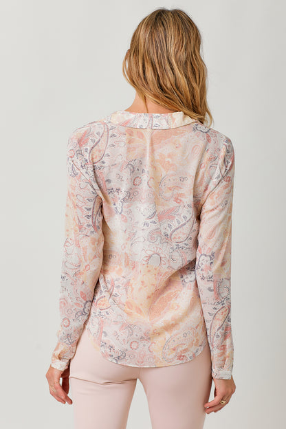 Semi-sheer pastel paisley tie-front blouse with V-neck and hi-lo hem.