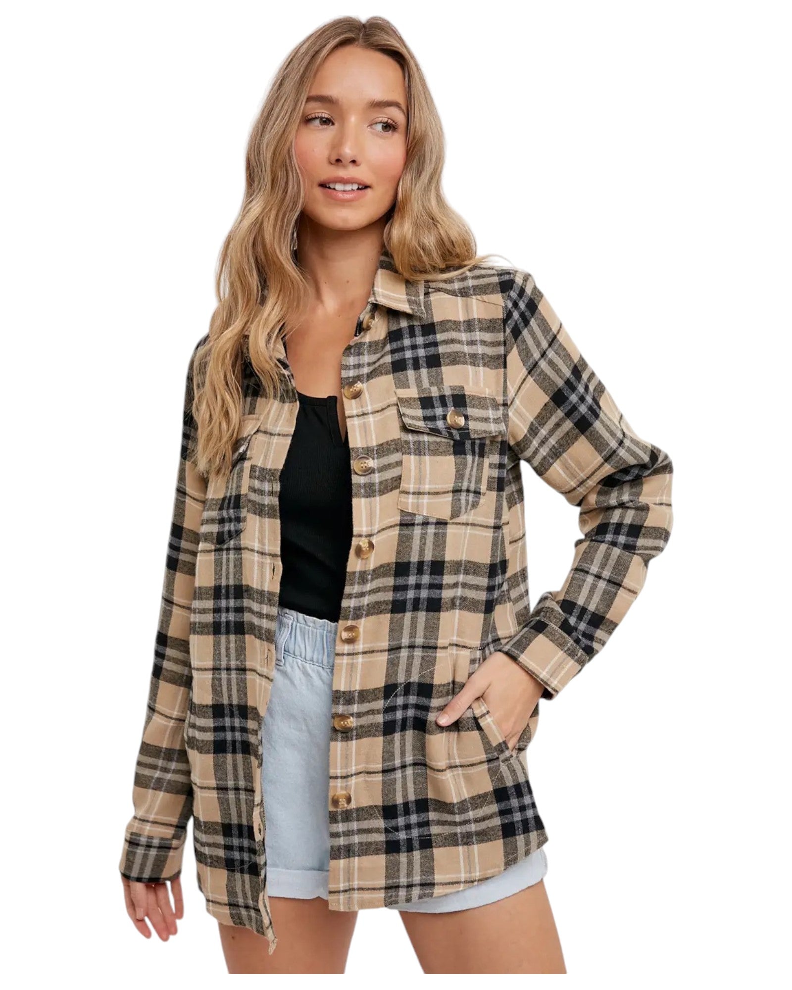 Woman wearing a Black, Tan and Cream Plaid Flannel Top and Black tank top. 