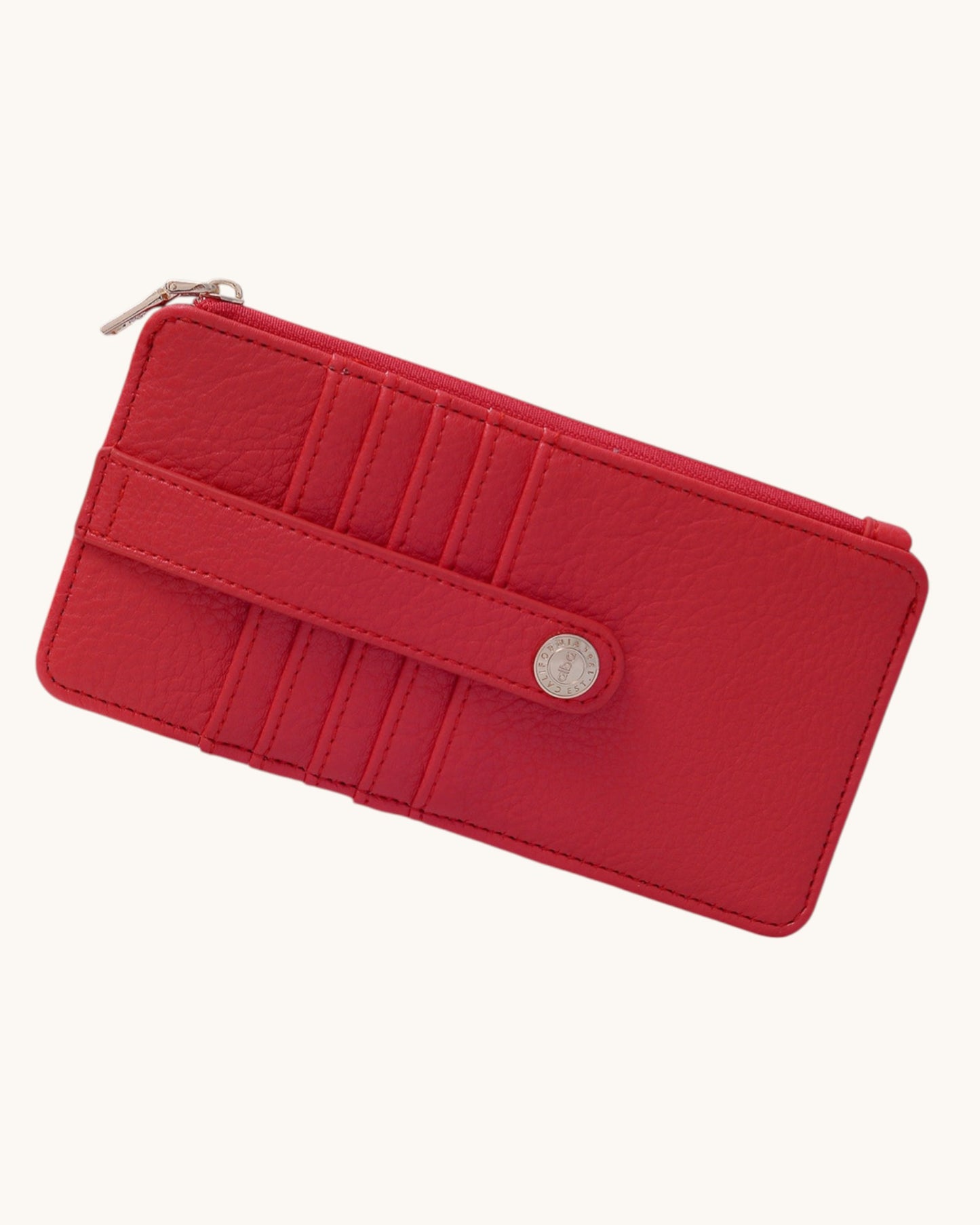 Red wallet with a zipper on a white background.