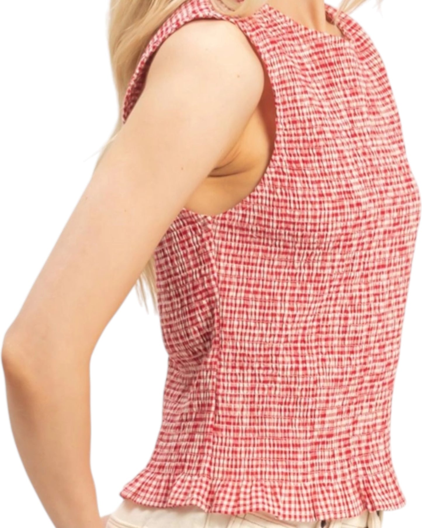 Red and white checkered sleeveless top worn by a person on a white background